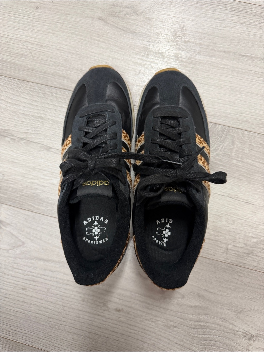 adidas Women’s Black Sneakers with Leopard Accents